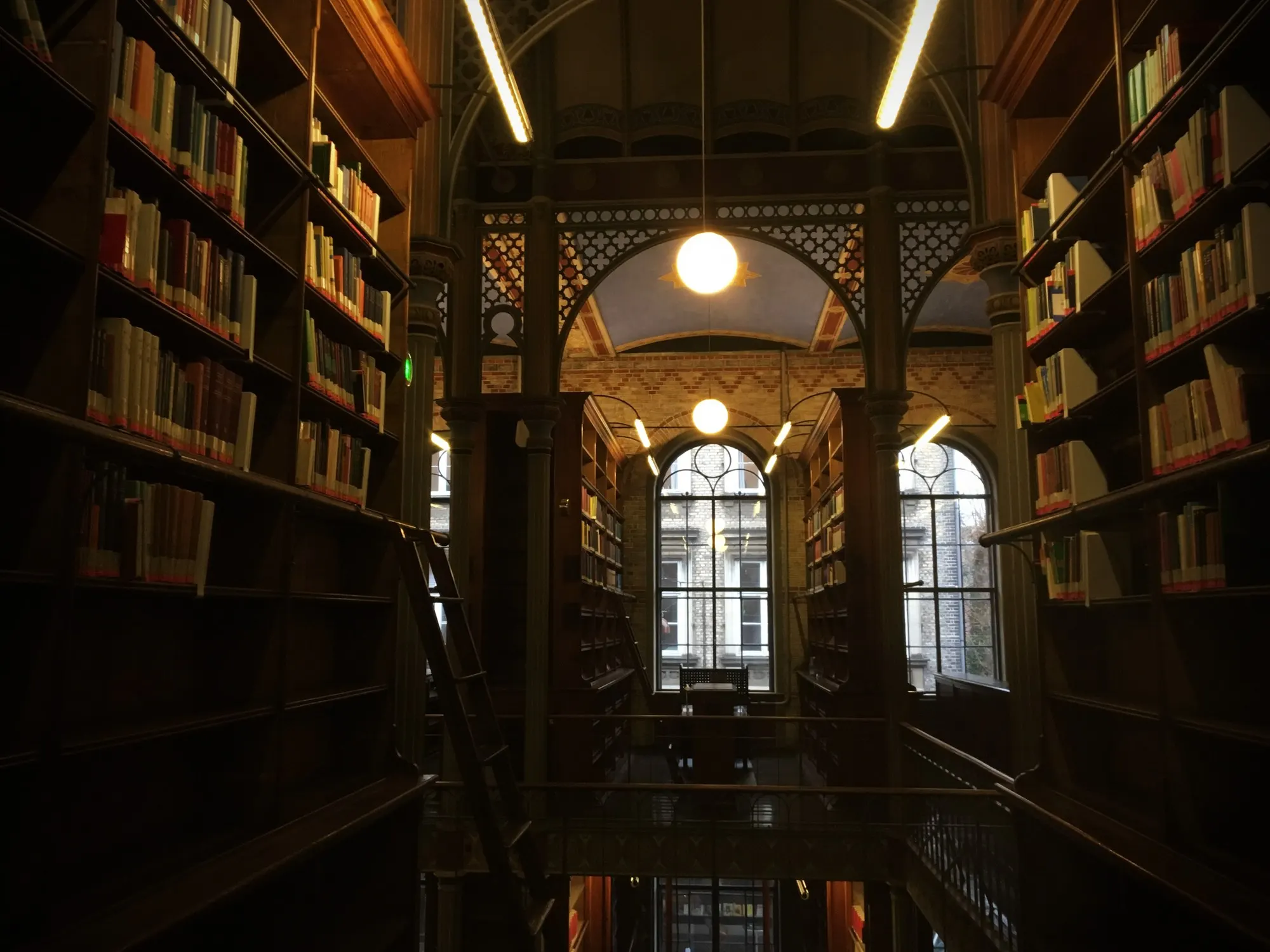 The interior of a grand university library.